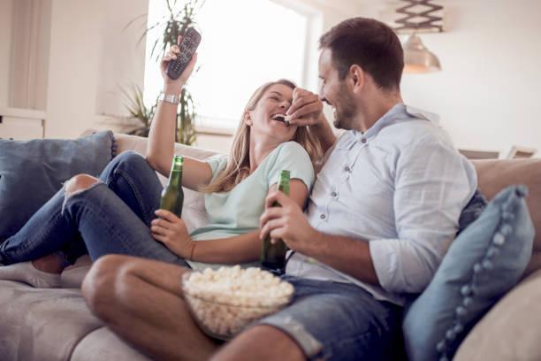 istock Young couple relaxing in their apartment 924525510