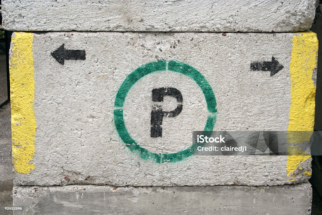 Cinder block parking sign  Authority Stock Photo