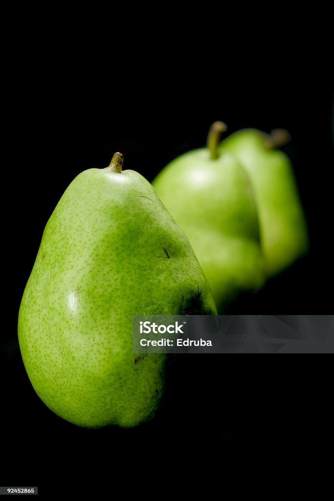 Tre verde Pears - Foto stock royalty-free di Cibo