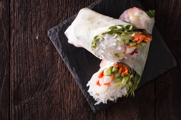 istock Delicious vietnamese spring roll with vegetable on dark background ,healthy food 924532134