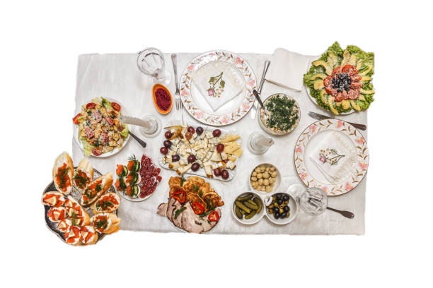 istock holiday table with dishes, with different dishes, salads isolated 924533084