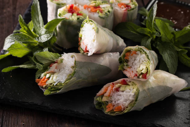 istock Delicious vietnamese spring roll with vegetable on dark background ,healthy food 924533600
