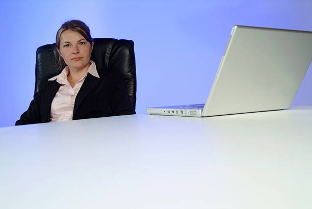 business woman at desk_01 stock photo