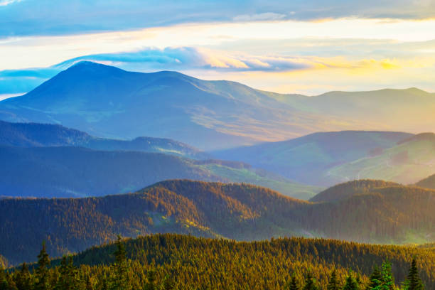 istock beautiful mountain valley in a blue mist at the evening 924536502