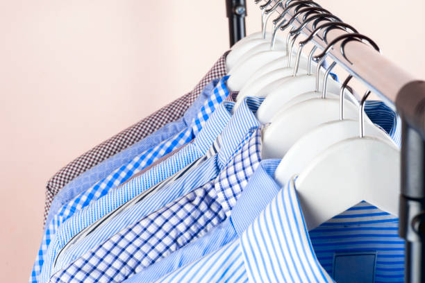 istock Cloth Hangers with Shirts. Men's clothes 924536618
