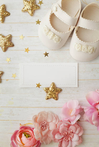 istock card with baby shoes 924536736