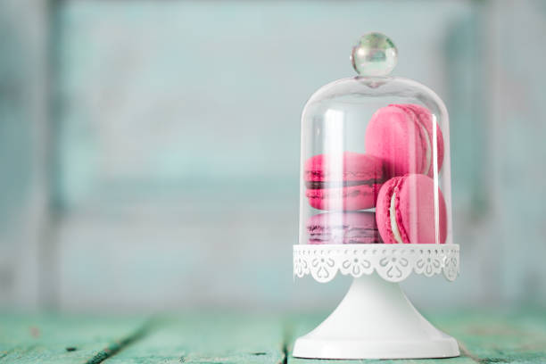 istock French cake macaroon on a wooden background. Colorful dessert 924540318