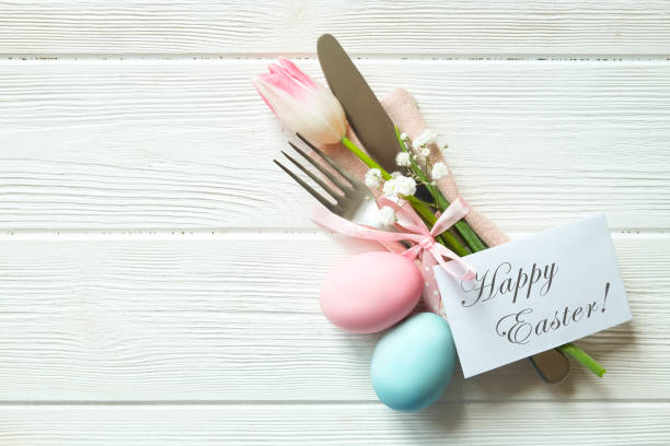 easter laying table appointments, table setting options. silverware, tableware items with festive decoration. fork, knife and flowers. happy easter holiday. - tablesetting imagens e fotografias de stock