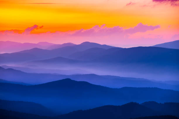 istock quiet mountain valley in a blue mist at the sunset 924551442