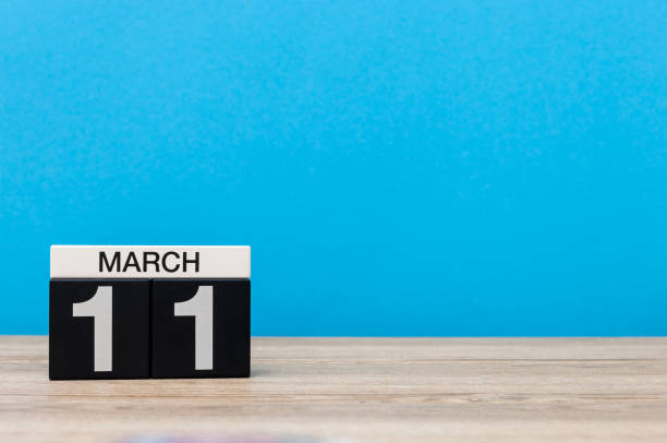 istock March 11th. Day 11 of march month, calendar on light blue background. Spring time, empty space for text, mockup 924553504