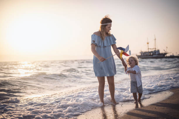 istock Mother and son at the beach 924553508