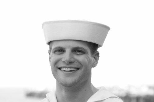 Black and white picture of seaman or sailor with slightly grain for retro effect.
