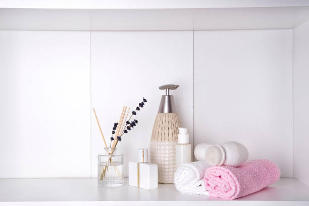 istock Various spa and beauty threatment products on white shelf 924553658