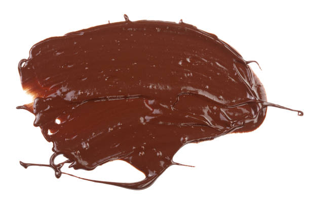 istock sweet chocolate sauce isolated on a white background 924554294