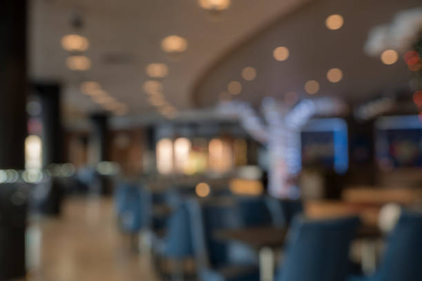 istock Abstract blur restaurant interior for background. Blur coffee shop or cafe restaurant with abstract bokeh light image background 924554502