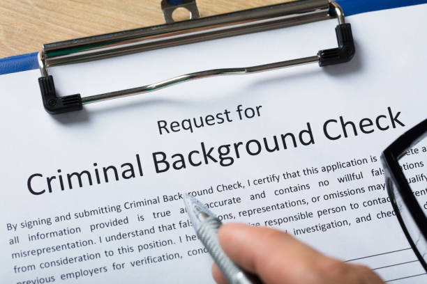 Hand Filling Criminal Background Check Application Form Stock Photo -  Download Image Now - iStock