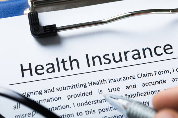 istock High Angle View Of Health Insurance Form 924554810