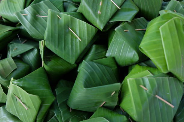 istock Thai dessert egg custard with sticky rice on banana leaf 924555108