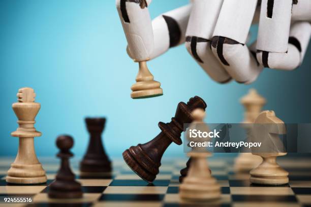 Robot Playing Chess Stock Photo - Download Image Now - Chess, Robot, Hand