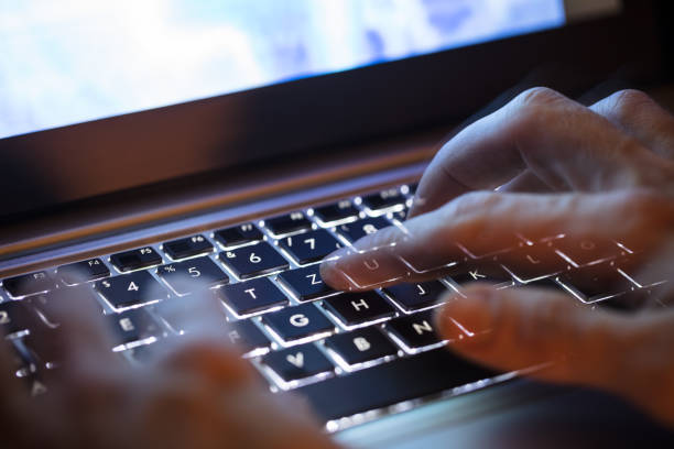 istock Person Typing On Laptop 924555606