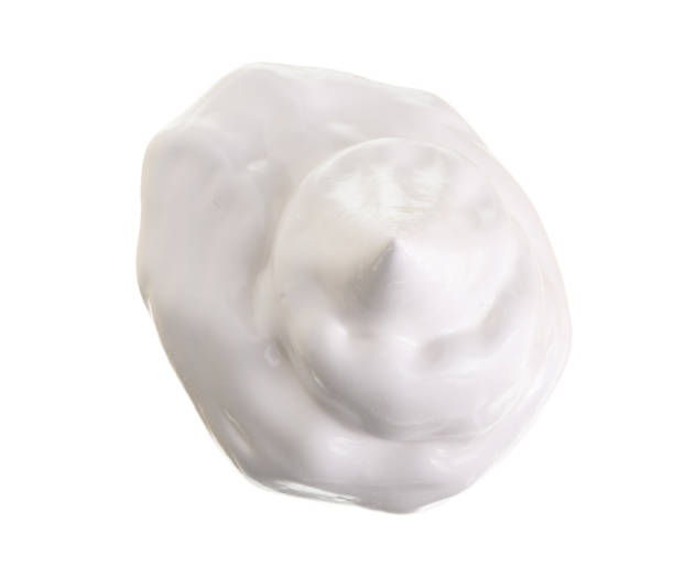 istock whipped cream or meringue isolated on white background. Top view. Flat lay 924558234