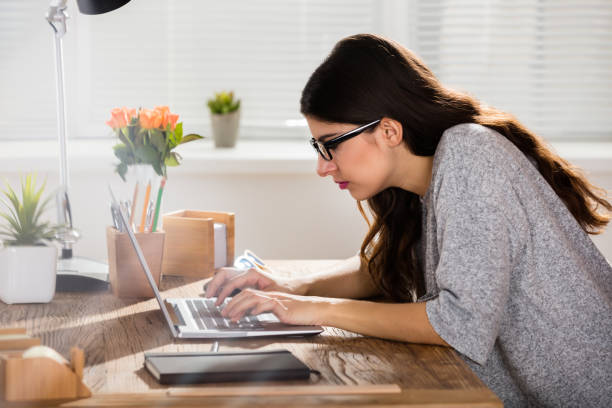 istock Businesswoman Sitting In Wrong Posture 924558474