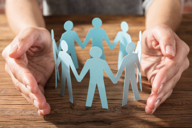 istock Person Protecting Paper Cut Out Figure 924558578