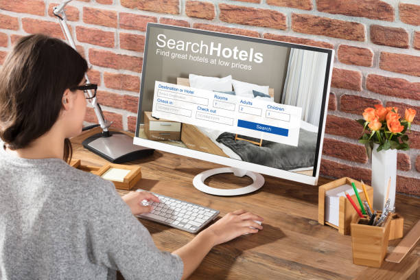 istock Woman Searching Hotels Online 924558638