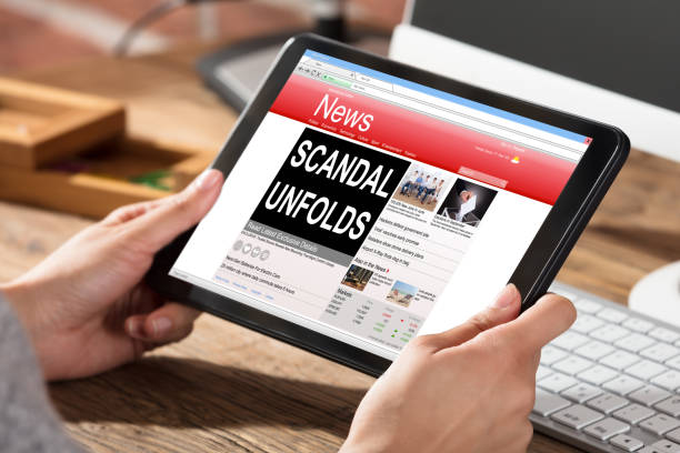 istock Woman Reading Scandal News On Digital Tablet 924558696