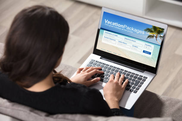 istock Woman Booking Vacations Packages On Laptop 924559230