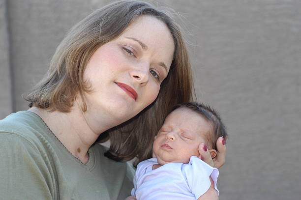 istock Mother holding Newborn 92456046