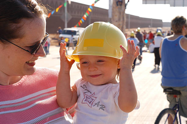 Toddler in Hard Hat stock photo