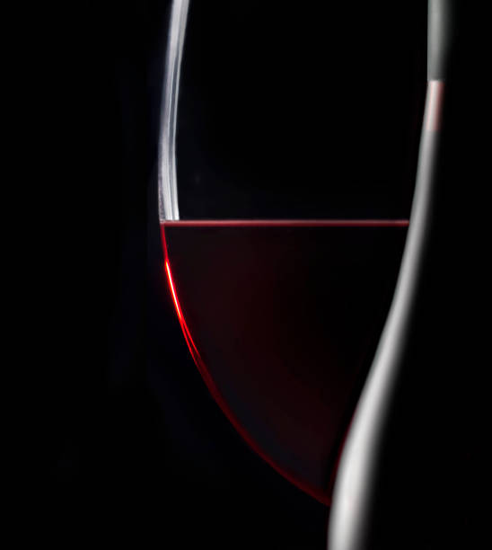 glass of rose wine on the old wooden table