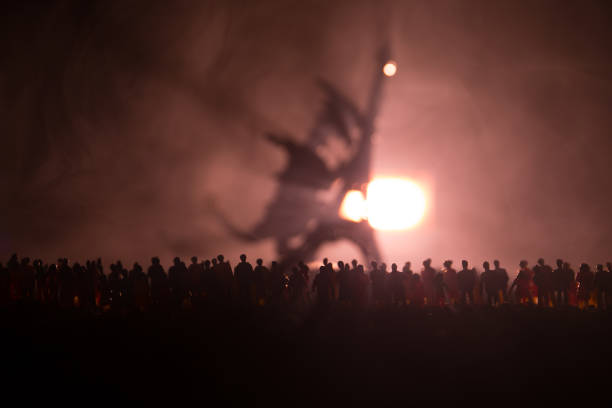 istock Blurred silhouette of giant monster prepare attack crowd during night. Selective focus. Decoration 924569888