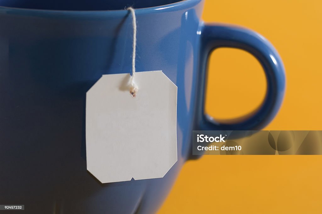 Chá rótulo pendurado em uma Caneca - Royalty-free Chá Foto de stock