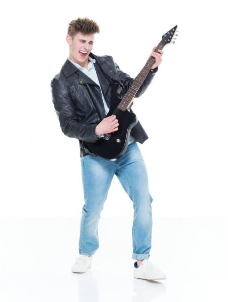 istock Handsome young male playing an electric guitar 924589438