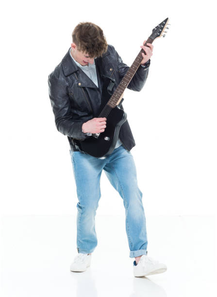 istock Handsome young male playing an electric guitar 924589446
