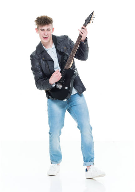 istock Handsome young male playing an electric guitar 924593244