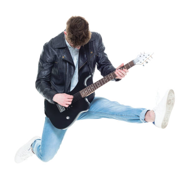 istock Handsome young male playing an electric guitar 924597738