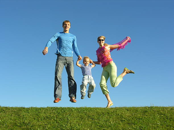 istock fly happy family on blue sky 92460086