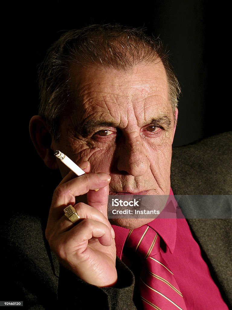 Smoking Gentleman Man posing with a cigarette... and a killer look. 60-64 Years Stock Photo