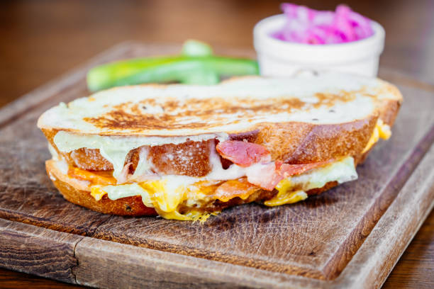 istock Close-Up Of Sandwich On Cutting Board At Table 924605480