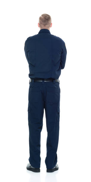 istock Handsome and friendly looking policeman with arms crossed 924609096
