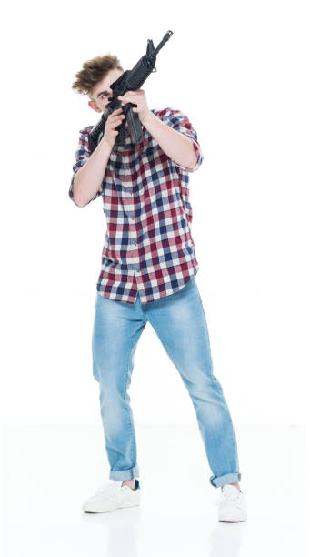 istock Teenager with assault rifle 924612534