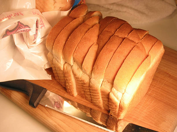 Rows of bread, stack rows of slices.