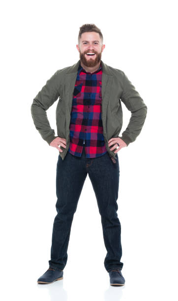 istock Man in bomber jacket and plaid shirt with hands on hips 924620254