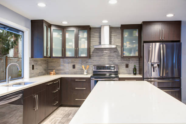 istock Updated contemporary kitchen room interior in white and dark tones. 924623912