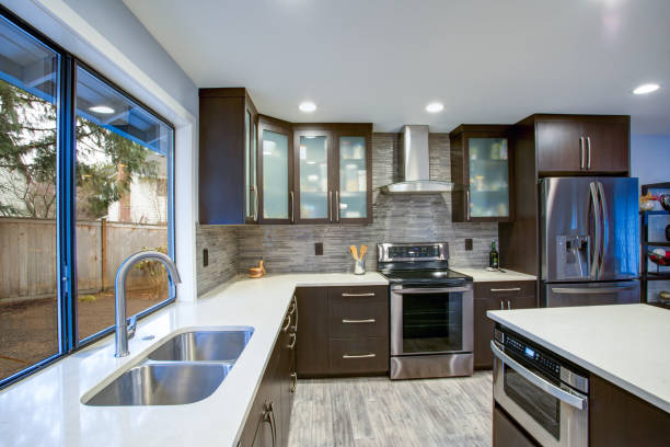 istock Updated contemporary kitchen room interior in white and dark tones. 924624154