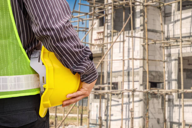 istock Asian business man construction engineer worker at house building site 924624250