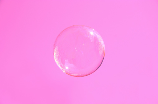 Background image with multiple soap bubbles on a white background.3D Rendering.